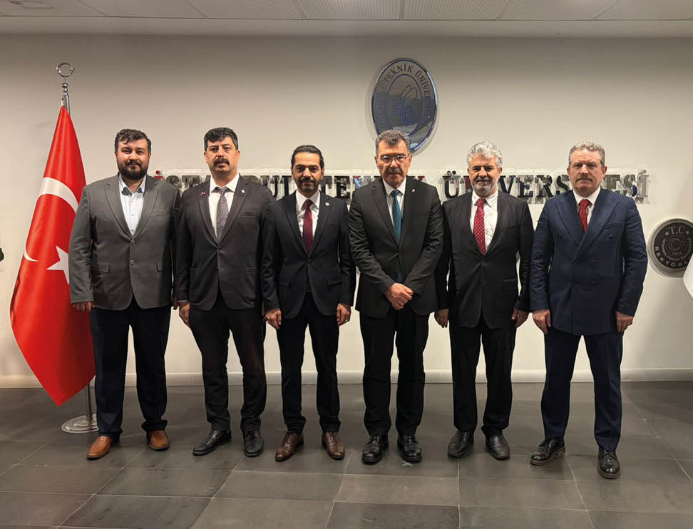 A group of men wearing suits and ties. Description generated by AI